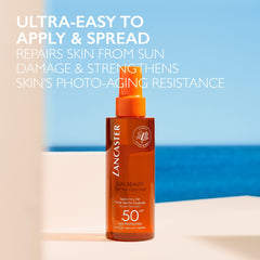 Lancaster Sun Beauty Oil bottle with outdoor sunlight background for bronzing routine.