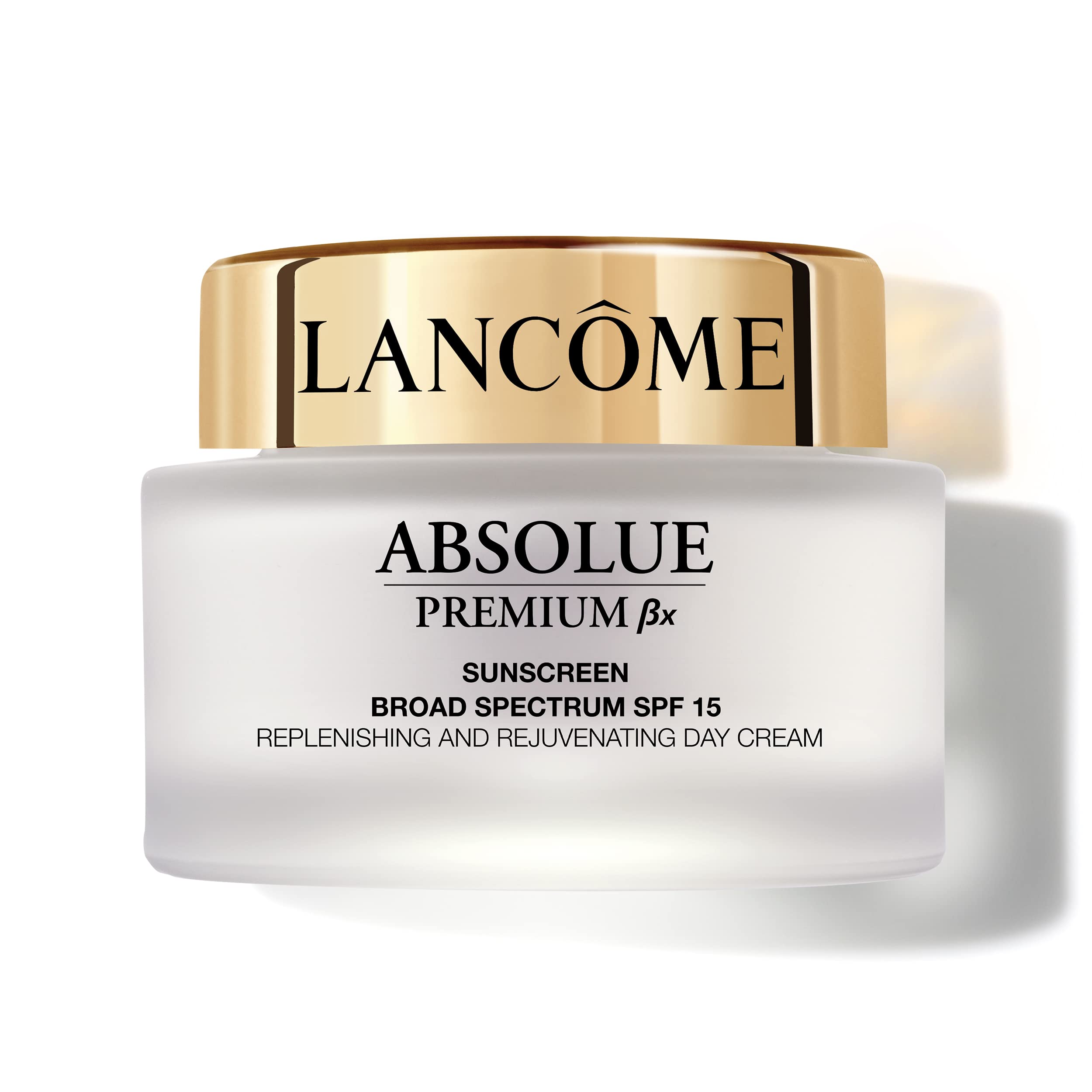 Lancôme Absolue Premium BX Day Cream bottle on vanity for daily hydration.