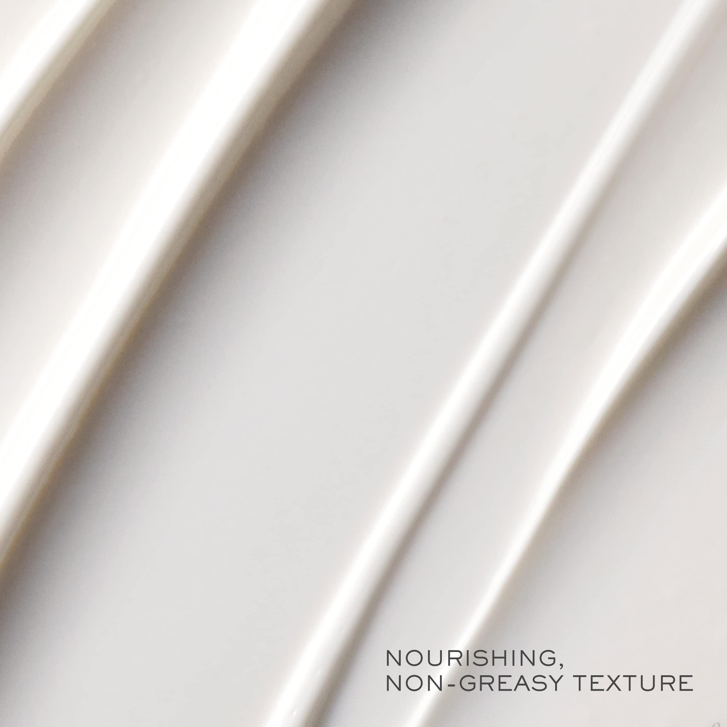 Close-up of Lancôme Absolue BX cream texture for smooth application.
