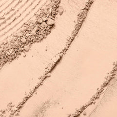 Lancôme Dual Finish powder texture close-up reveals silky natural matte finish.