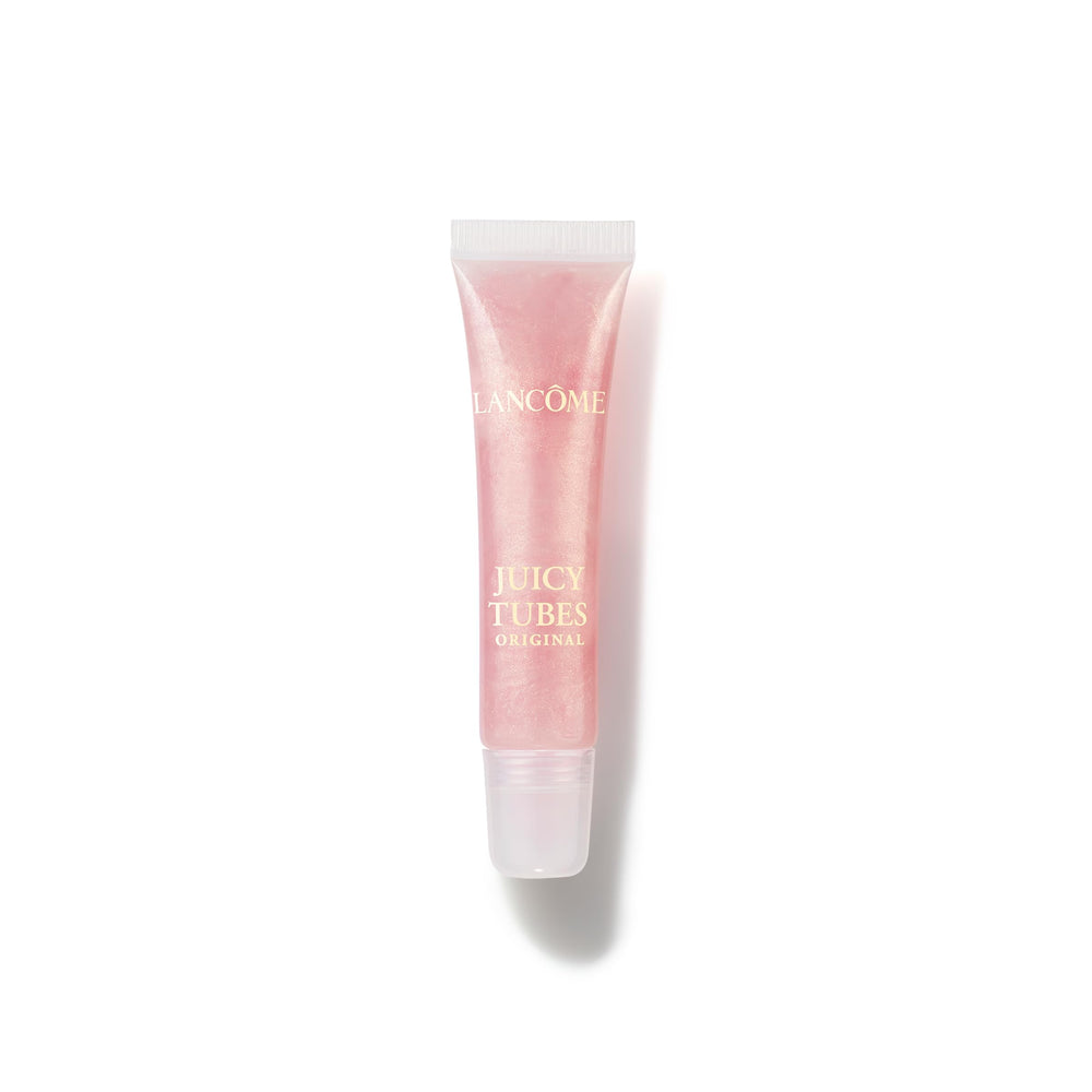 Lancôme Juicy Tubes gloss cap close-up showing radiant shine and smooth application.