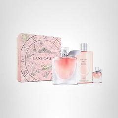 User applies Lancôme La Vie Est Belle on neck and wrist.