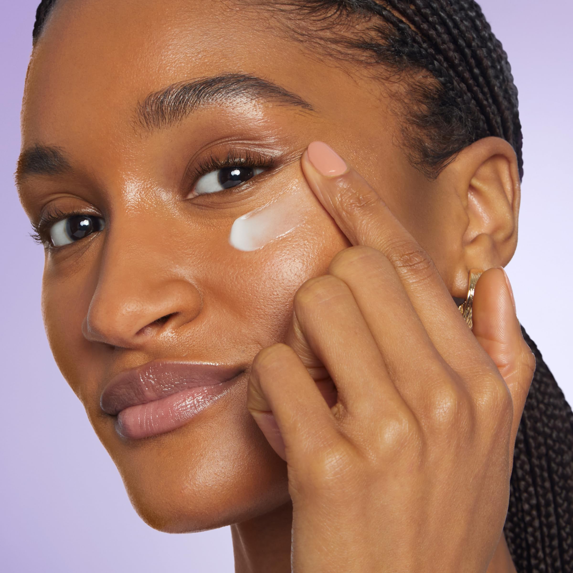Cream texture glides onto skin, delivering moisture around the eyes.