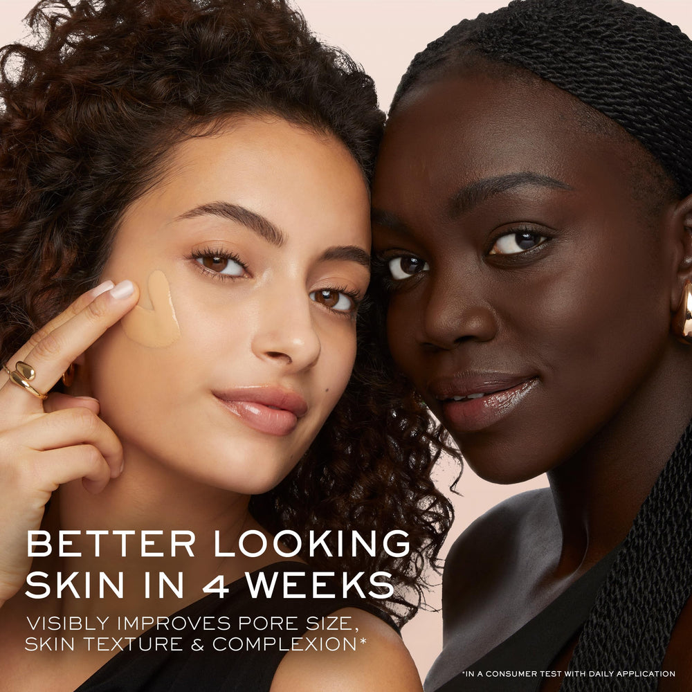 Lancôme Teint Idole Ultra Wear applicator wand in use for smooth application.