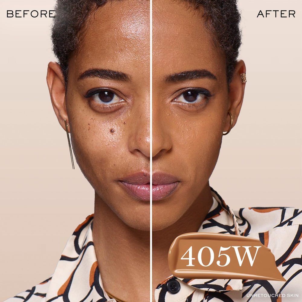 Applying Lancôme Teint Idole Ultra Wear foundation for smooth blending on cheek.