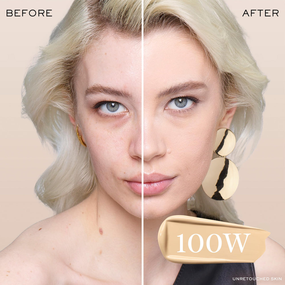 Lancôme Teint Idole Ultra Wear swatch demonstrates warm 100W shade on fair skin.