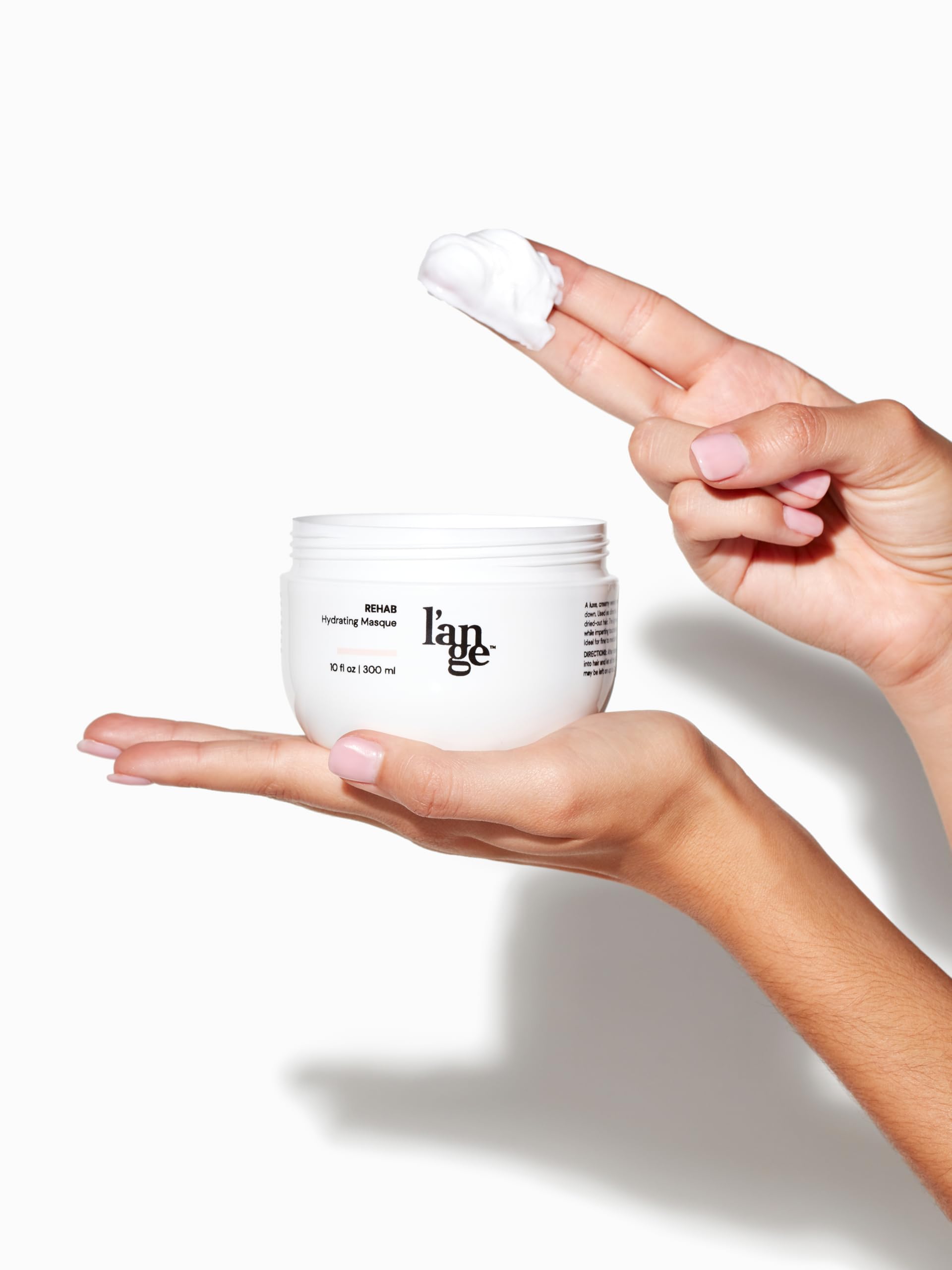 L'ANGE HAIR Rehab Hydrating Masque jar close-up highlights keratin formula.