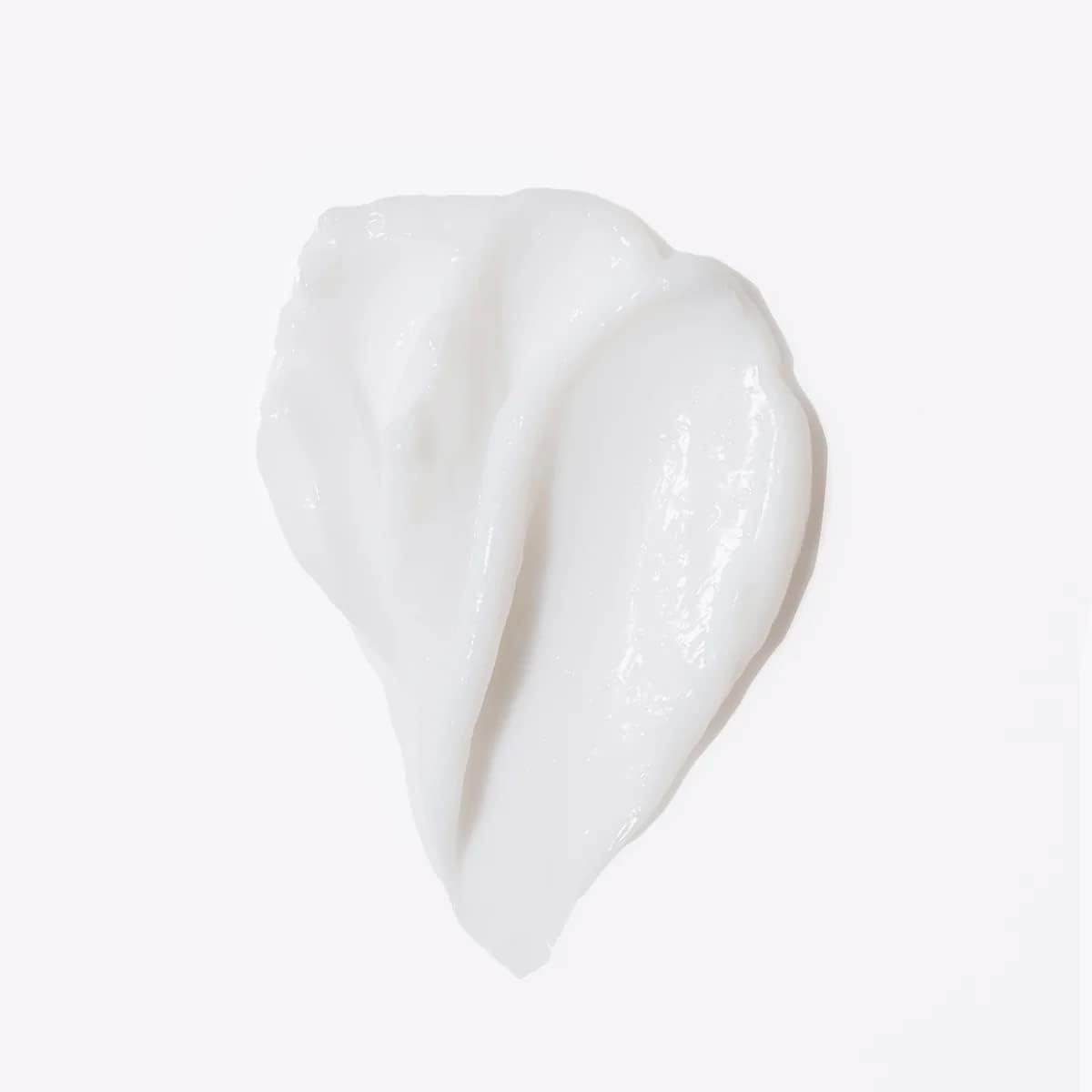 L'ANGE HAIR Curl Care in use on damp hair for detangling.