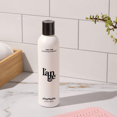 L'ANGE HAIR Curl Care Conditioner on hair showing frizz control and shine.