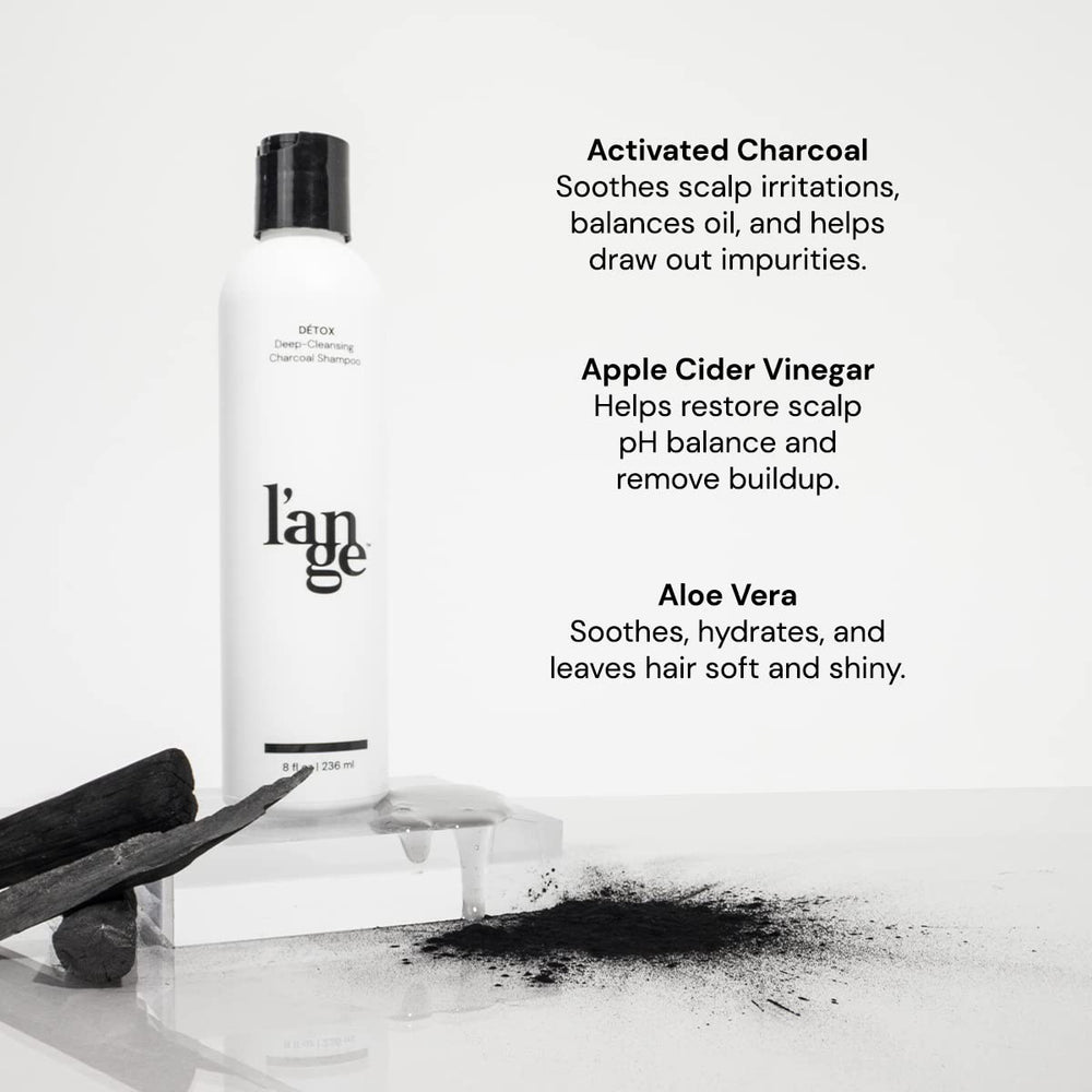 L'ANGE HAIR Detox charcoal shampoo being poured for cleansing.