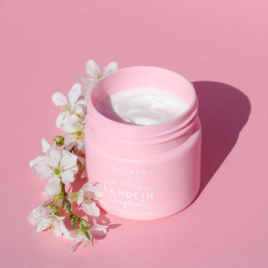 Lanocreme lanolin face cream jar close-up for soothing, nourished skin and easy daily application.