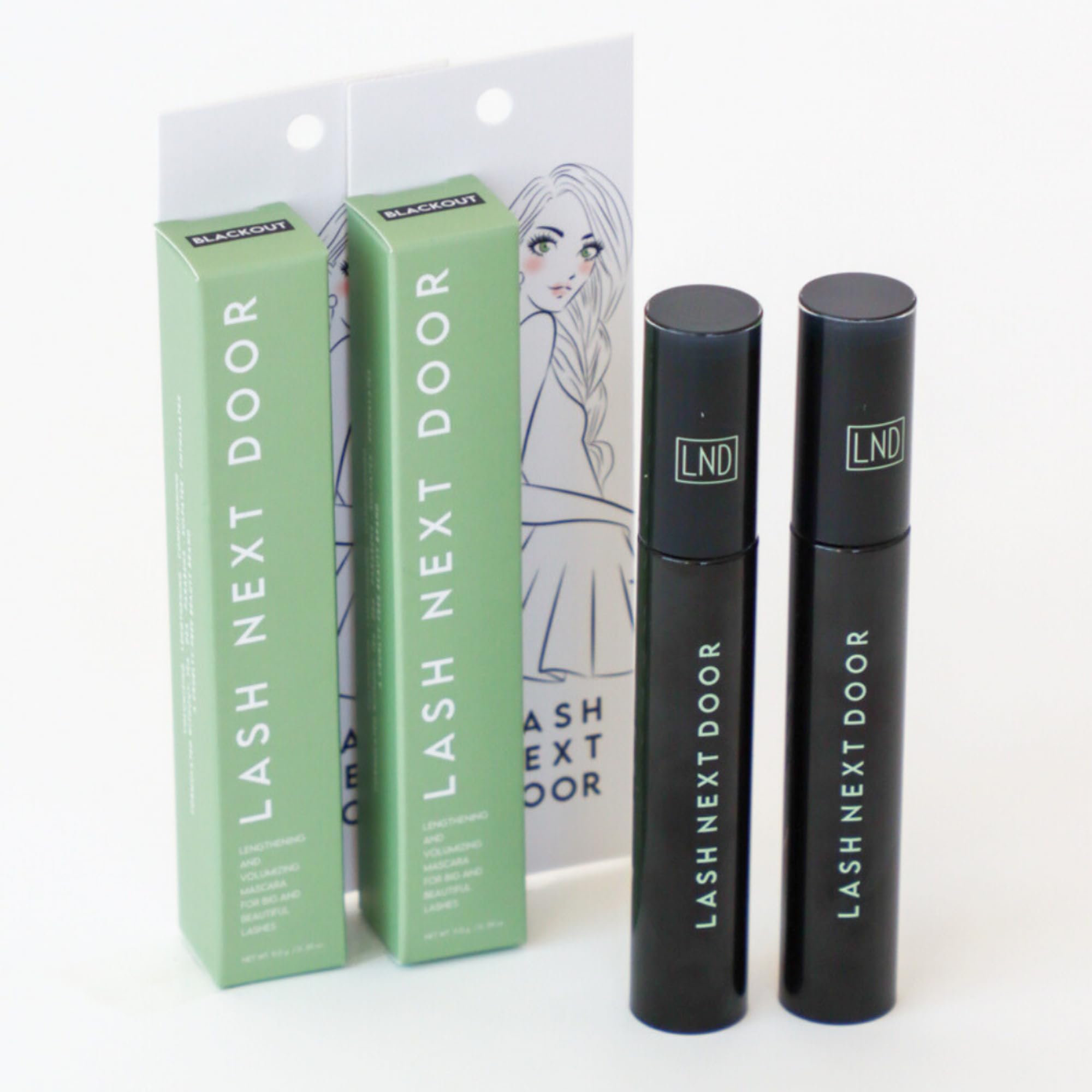 Lash Next Door mascara travel size pack fits neatly in a makeup bag.