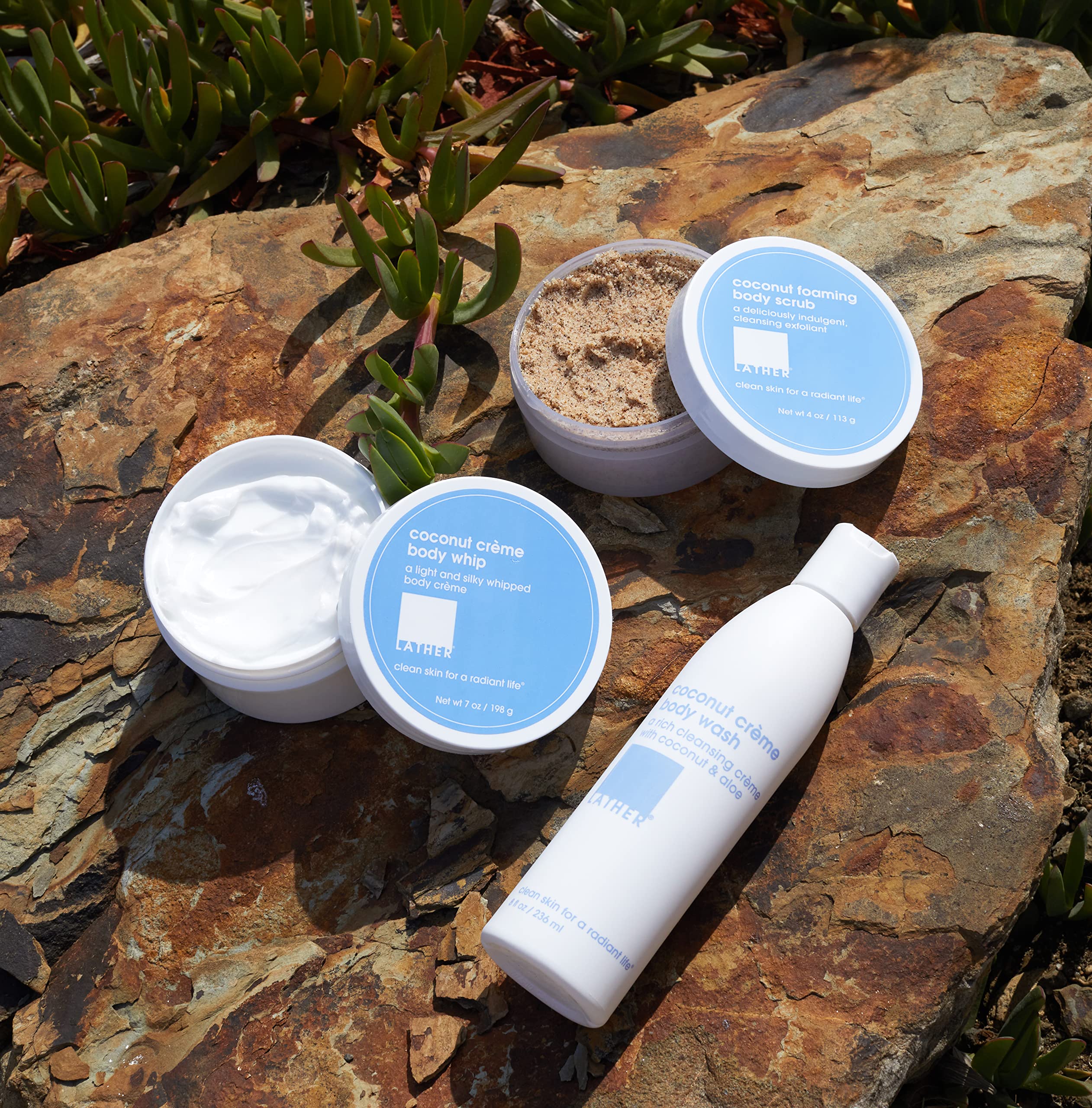 Hands applying LATHER Body Whip demonstrates easy, fast-absorbing use.