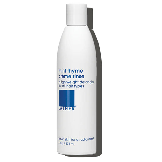 LATHER Mint Thyme Crème Rinse bottle pouring for effortless detangling