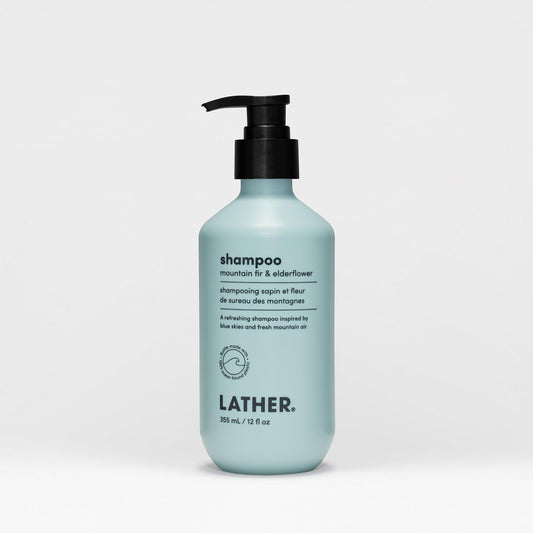 LATHER Mountain Fir and Elderflower shampoo bottle for all hair types, gentle cleansing.