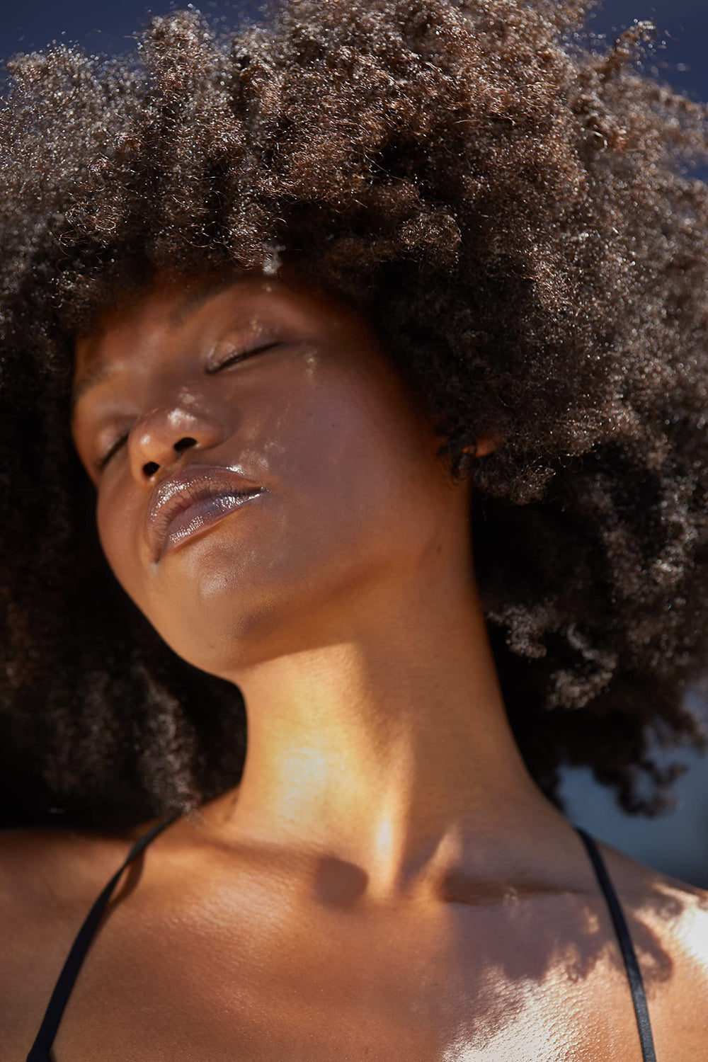 LATHER Ultra Light texture being applied for fast, non-greasy hydration.