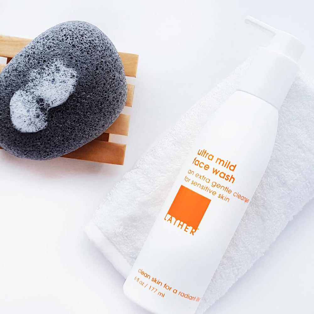 LATHER Ultra Mild Face Wash foaming cleanser creating a rich, hydrating lather.