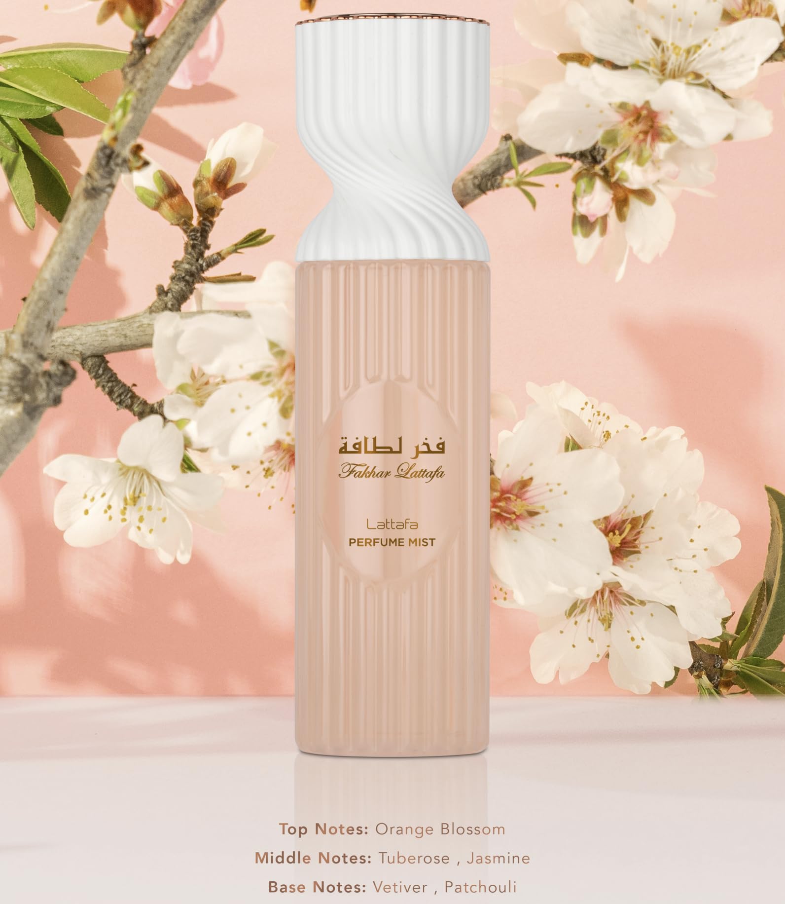 Lattafa Fakhar Perfume Mist spray close-up, emphasizing a light, refreshing floral aroma