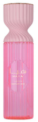 Lattafa Haya Perfume Mist pink champagne opening for a fresh daytime boost.