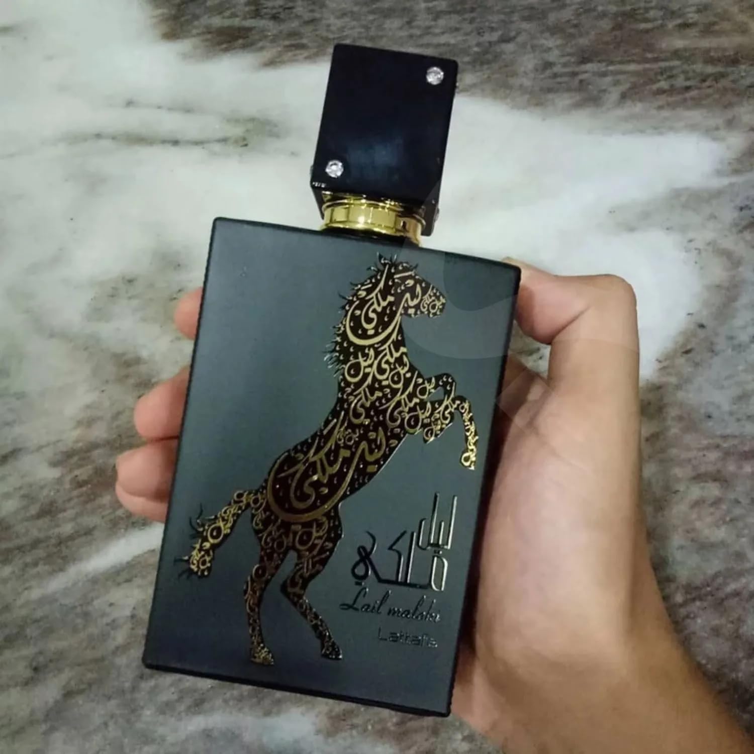 Lattafa Lail Maleki EDP wrist application for versatile evenings