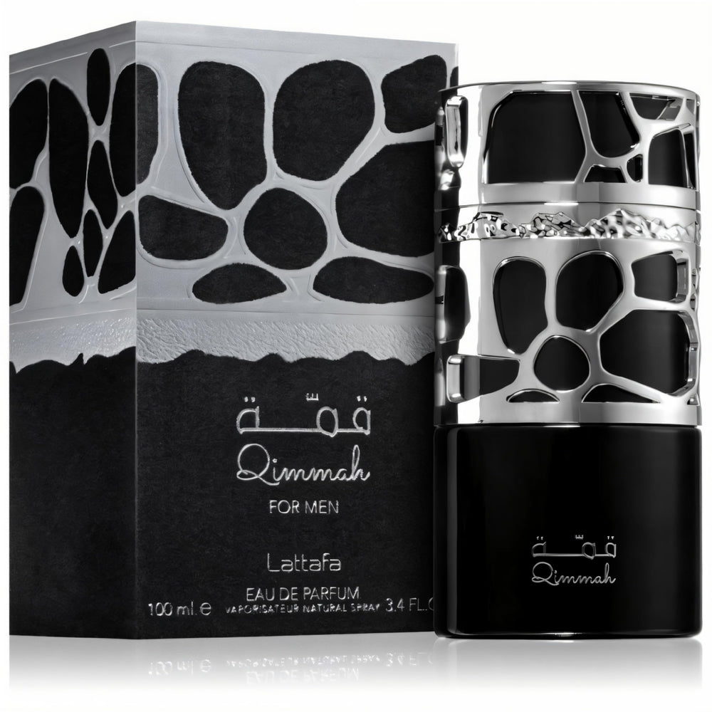 Lattafa Qimmah bottle closeup highlights creamy woody base hints for any occasion.