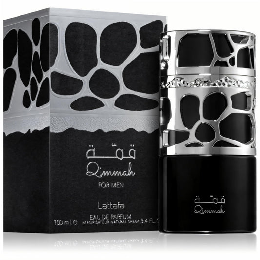 Lattafa Qimmah bottle closeup highlights creamy woody base hints for any occasion.