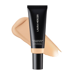 Laura Mercier tinted moisturizer bottle with blurred matte finish for shine control.