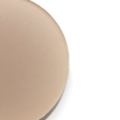 Lauren Brooke Cosmetiques pressed foundation on skin close-up showing matte finish.