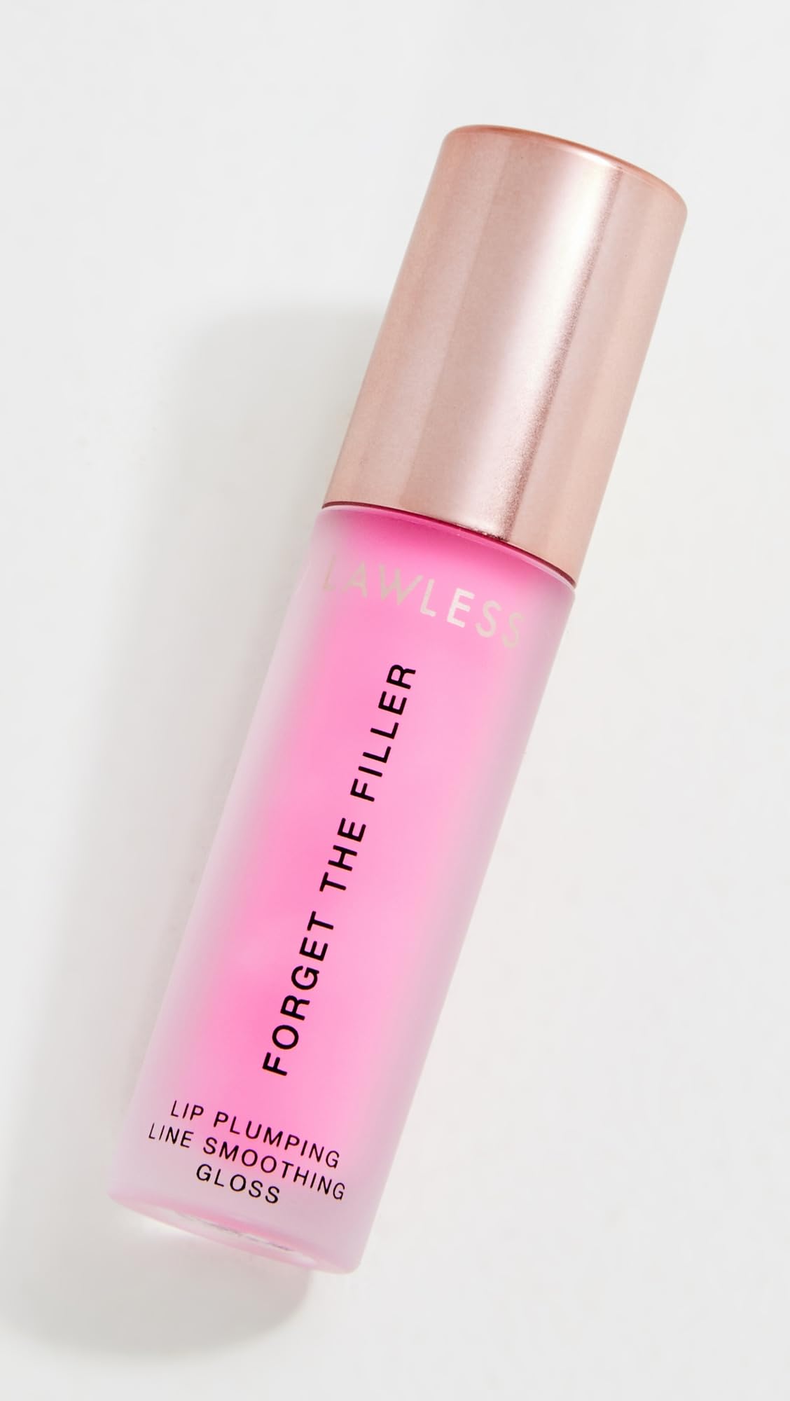 Lawless Forget the Filler Daisy Pink gloss wand applying plump, smooth look