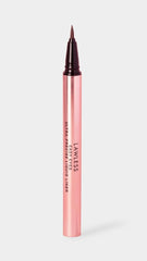 Close-up of the precision brush applying Lawless liner for smooth control.