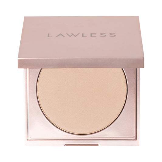 Lawless talc-free powder in Fair shade shown in a compact for easy touch-ups