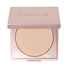 Lawless talc-free powder in Fair shade shown in a compact for easy touch-ups