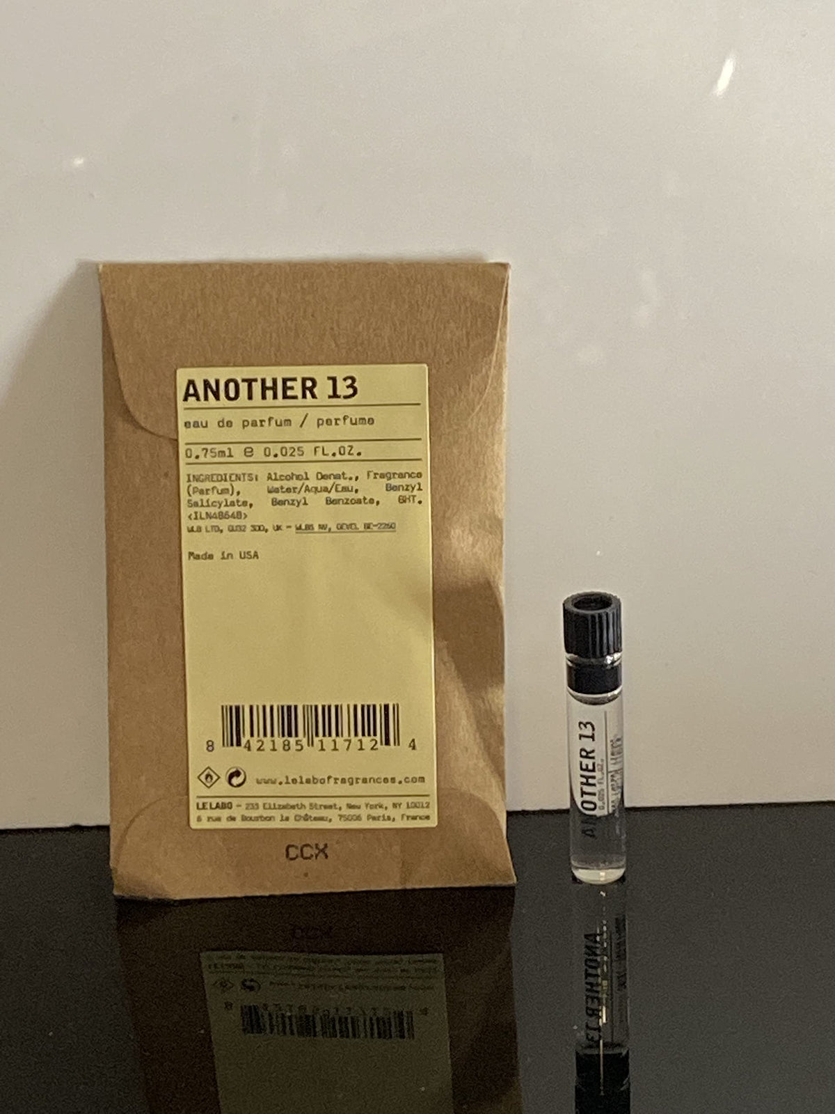Le Labo Another 13 dabber sample bottle, compact and portable for testing.