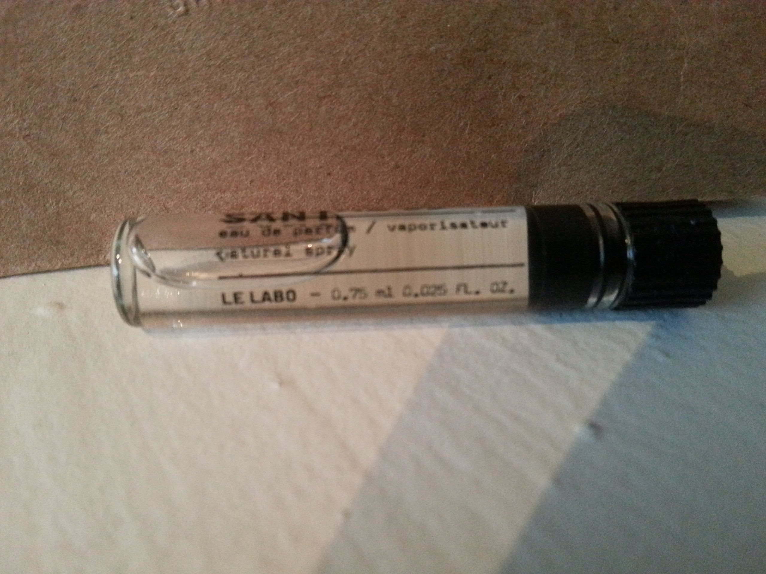 Santal 33 cap close-up shows premium craftsmanship and branding