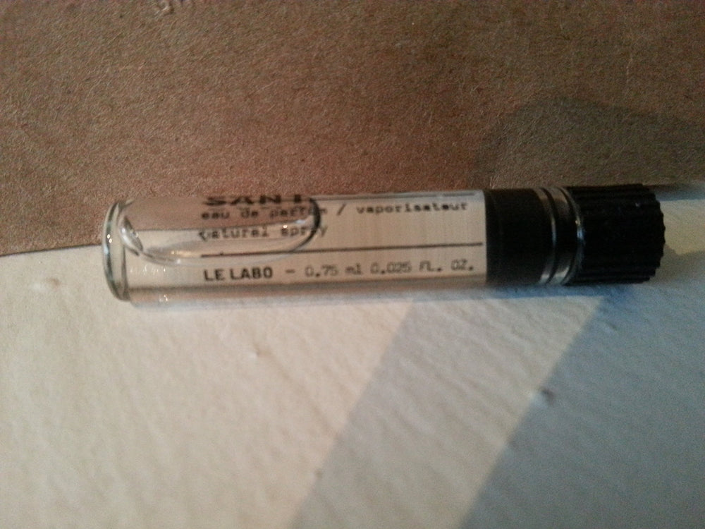 Santal 33 cap close-up shows premium craftsmanship and branding
