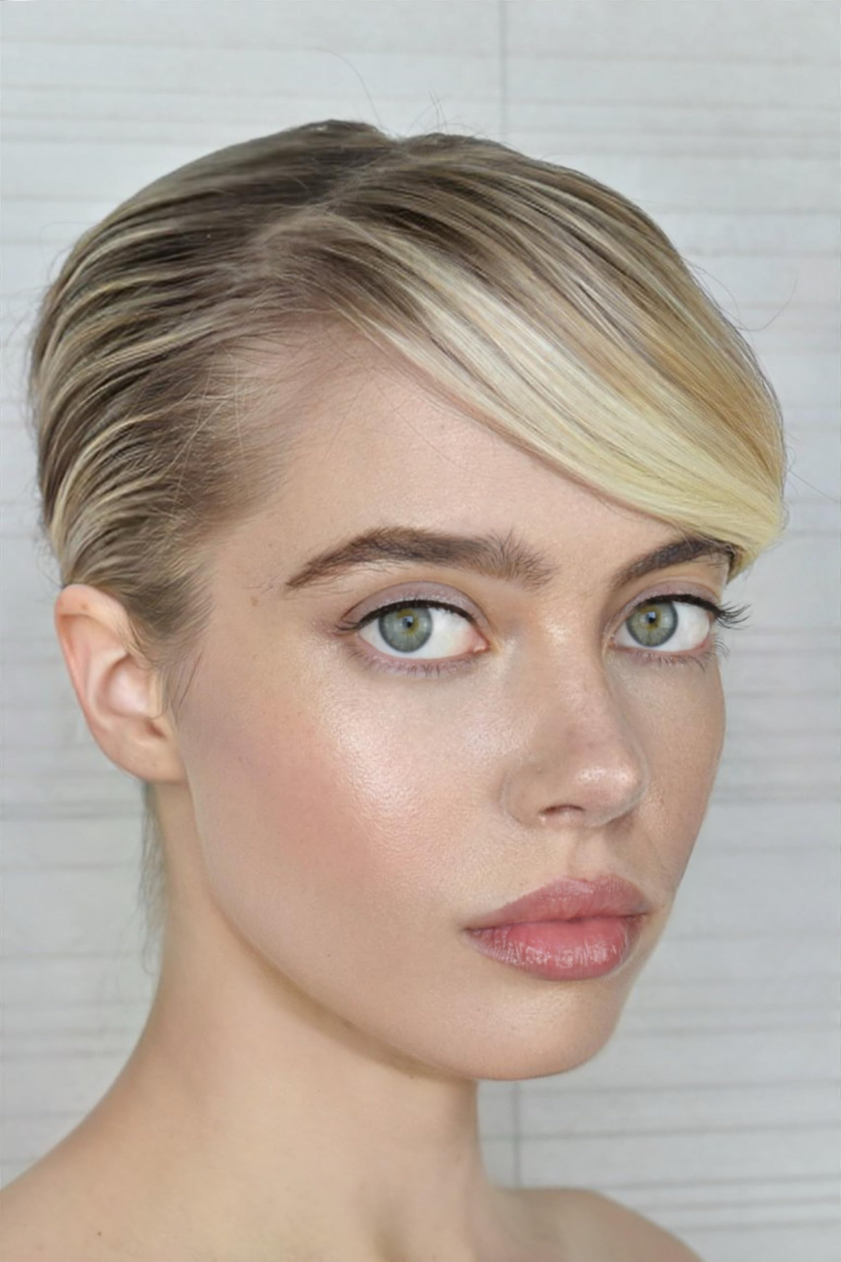 Le Metier De Beaute creme fresh tint on lips for hydrating color.