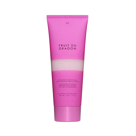 Le Monde Gourmand Fruit du Dragon scrub bottle pour releases tropical fragrance while cleansing skin