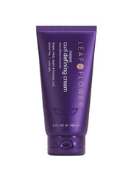 Leaf & Flower Instant Curl Defining Cream bottle on display for hydration and frizz control.