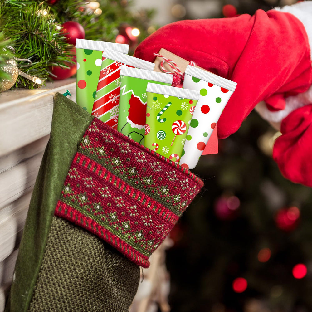 Festive Leelosp Christmas hand cream tubes showcased in red and green packaging.