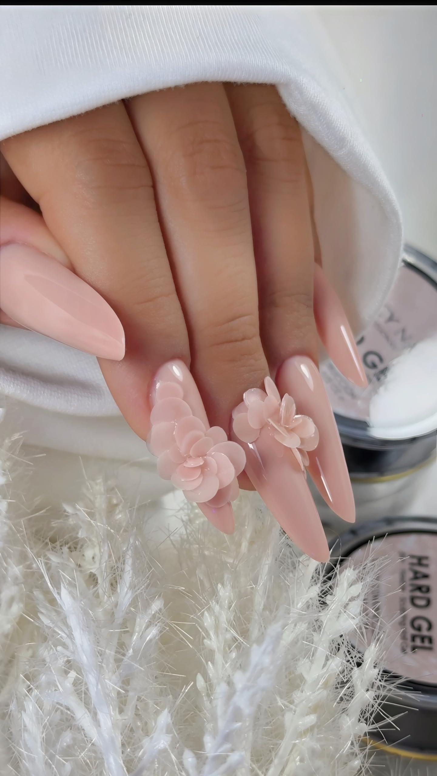 Legacy Nails gem attachment glue keeps decorative stones securely in place.
