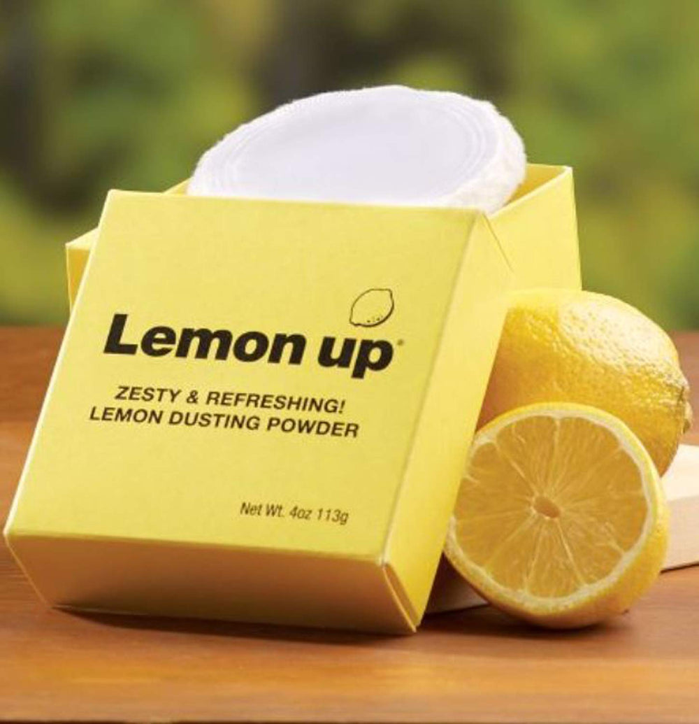 Lemon Up dusting powder jar displaying talc-free formula for a fresh feel.