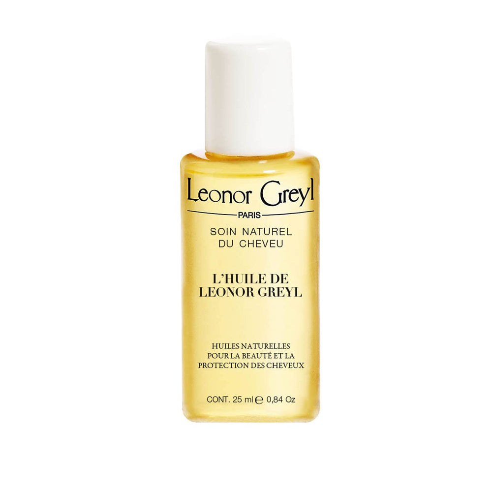 Leonor Greyl L'Huile Pre-Shampoo bottle shown, protecting hair from sun and chlorine.