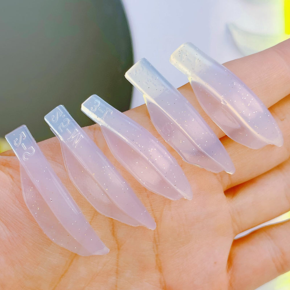 Liber Beauty DIY tip: apply glue to bottom shields for secure adhesion when alone.