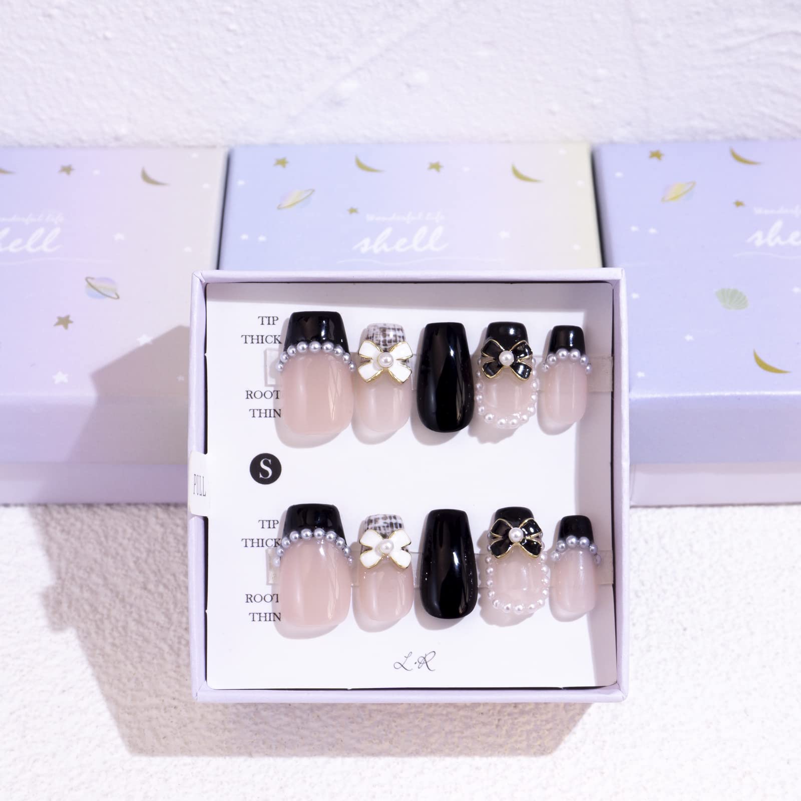 Light Rain hand-made nails design close-up with 3D gel finish for salon-quality look.