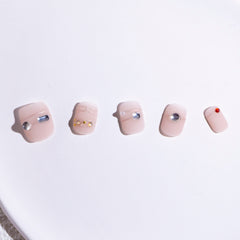 Light Rain medium-size press-on nails designed by a pro manicurist.