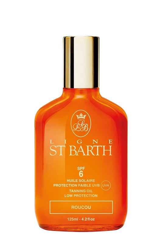 Ligne St Barth Roucou Tanning Oil bottle with sunlit glow, lightweight texture for bronzing