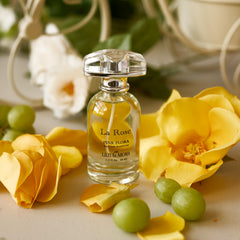 Liliya's Aroma La Rose cap detail signals premium quality and long-lasting impression