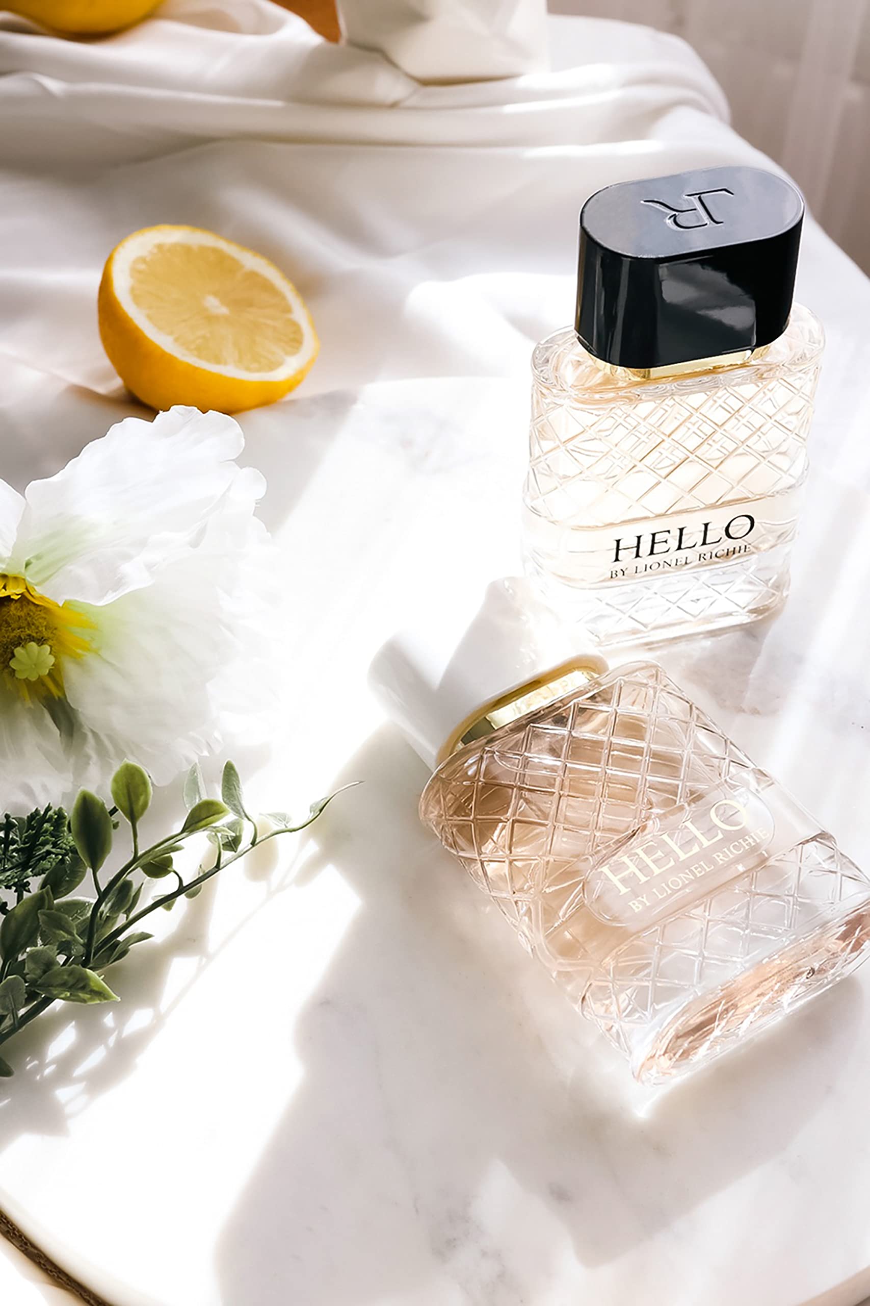 Lionel Richie Hello for Women bottle angled display, showcase compact elegance and ease of use.
