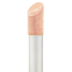 Pink Moon application on cheekbones for subtle lift and hydration.