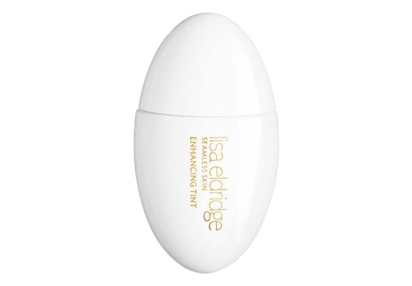 Lisa Eldridge Seamless Skin Tint T4 bottle close-up for neutral golden undertone and natural-looking coverage.